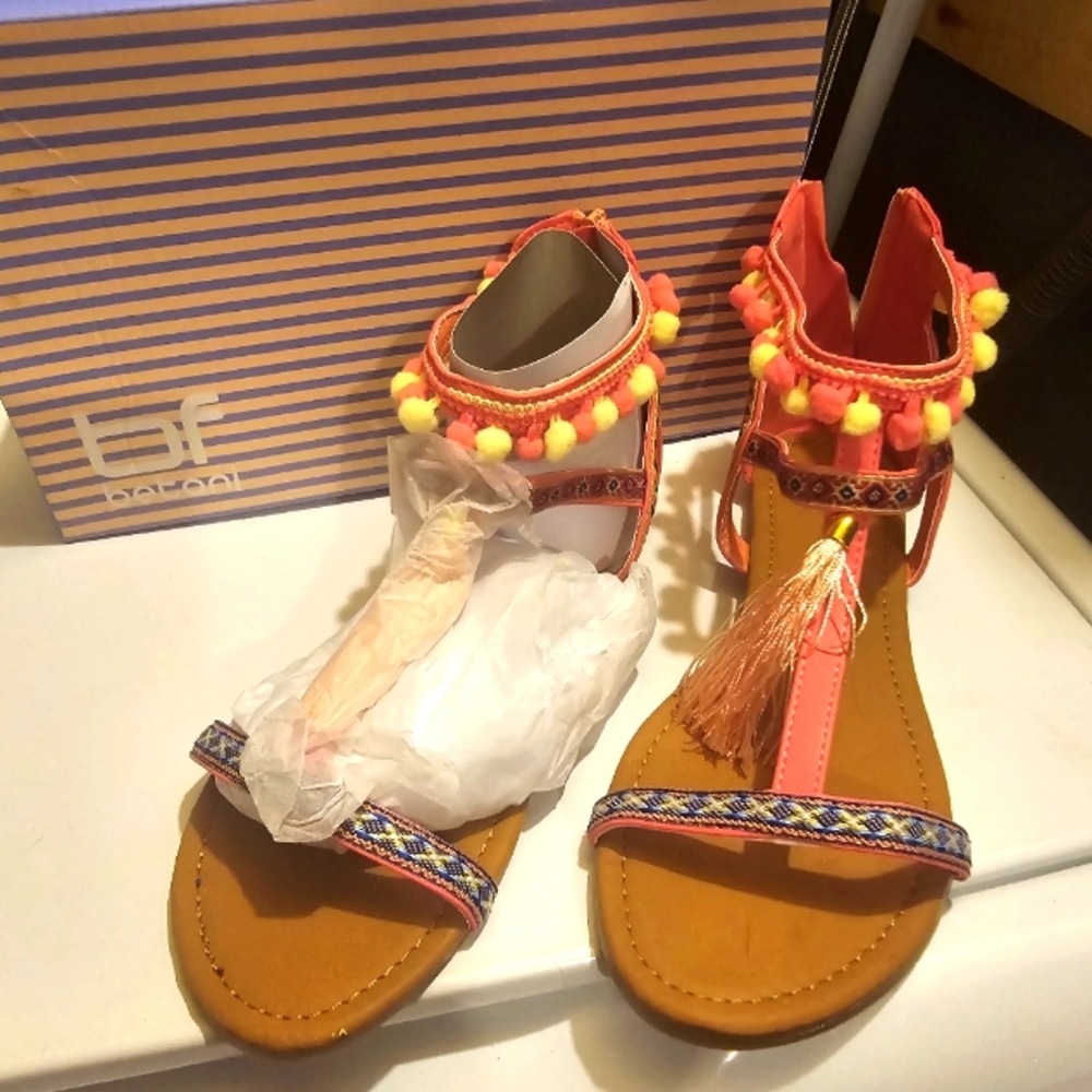 Brand new still in box, never been worn adorable pink with yellow balls